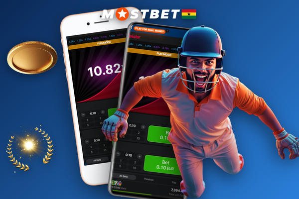 Hand holding Android phone playing Mostbet Aviator with cash-out button visible mid-flight